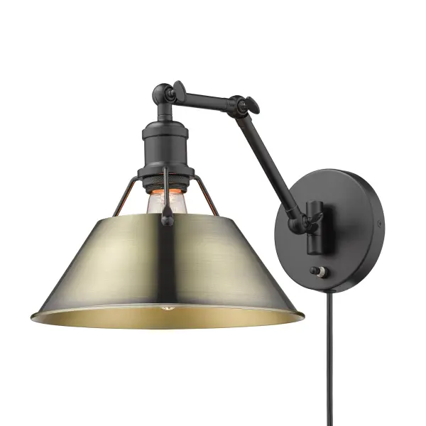 The Orwell swing arm wall lamp combines industrial elegance with practical functionality. Its adjustable arm and height make it perfect for reading or task lighting, while the matte black and aged brass finish adds vintage charm. - alternate view