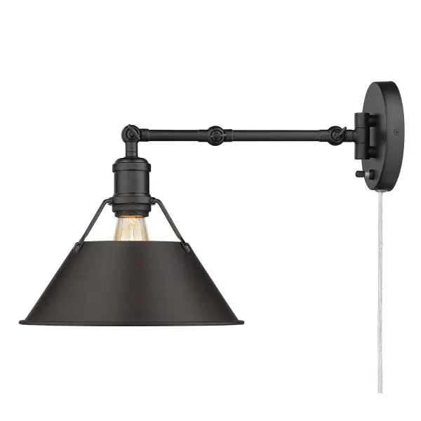 The Orwell swing arm wall lamp combines industrial style with modern functionality. Its adjustable arm and plug-in design make it ideal for bedside reading or desk task lighting, while the matte black and rubbed bronze finish adds sophisticated warmth. - alternate view