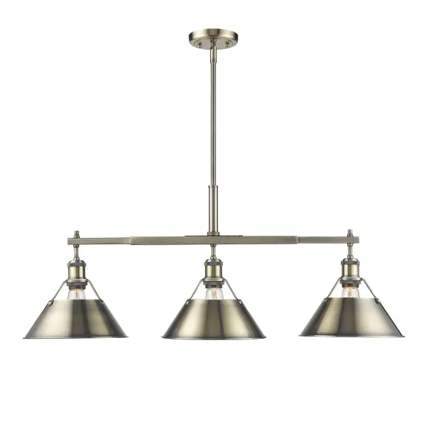 The Orwell 3-Light Island Light combines industrial design with aged brass warmth, creating a statement piece perfect for kitchens and dining areas. Its adjustable height and sloped-ceiling compatibility offer installation flexibility.