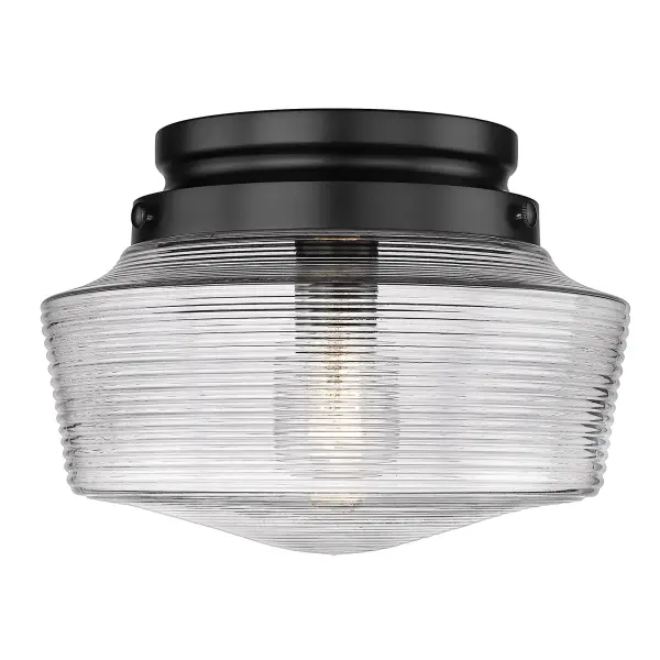 The Holloway flush mount delivers vintage industrial charm in a compact profile ideal for low-ceiling spaces. Its clear glass shade showcases the bulb while the matte black finish adds modern sophistication.