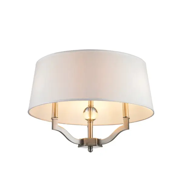 The Waverly combines classic elegance with modern versatility through its convertible mounting system and refined pewter finish. The fabric drum shade provides soft, diffused lighting ideal for mid-height ceilings.