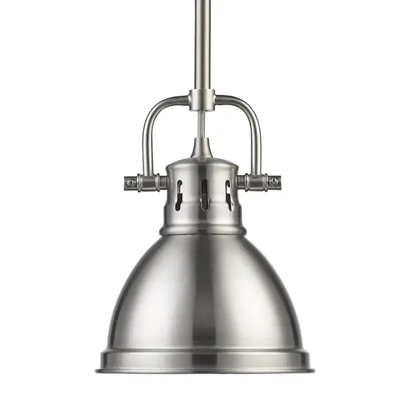 The Duncan mini pendant combines industrial charm with transitional versatility. Its pewter metal shade diffuses light beautifully while the compact 6.5" diameter makes it ideal for smaller spaces or grouped installations over islands and dining tables.