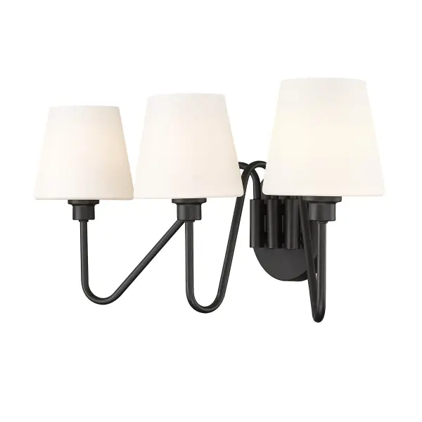 Bring transitional elegance into your home with the Yep by Golden Lighting Kennedy 3-light Vanity in Natural Black. Featuring Opal Glass shades and a Natural Black frame, it creates a welcoming atmosphere perfect for any bathroom. The Opal Glass shades diffuse light evenly, creating a soft, glare-free glow that enhances the ambiance of your space. Our Natural Black finish offers a softer take on traditional dark colors, with a tactile, grounded feel that complements various design styles. This vanity light is damp location rated and ideal for spaces with occasional moisture. Requires 3 E12 Candelabra base bulbs (not included), max 60 wattage each. Overall dimensions: 23.5"W x 10"H x 9"D. Add a touch of elegance and sophistication to your lighting with this beautifully designed fixture. - alternate view