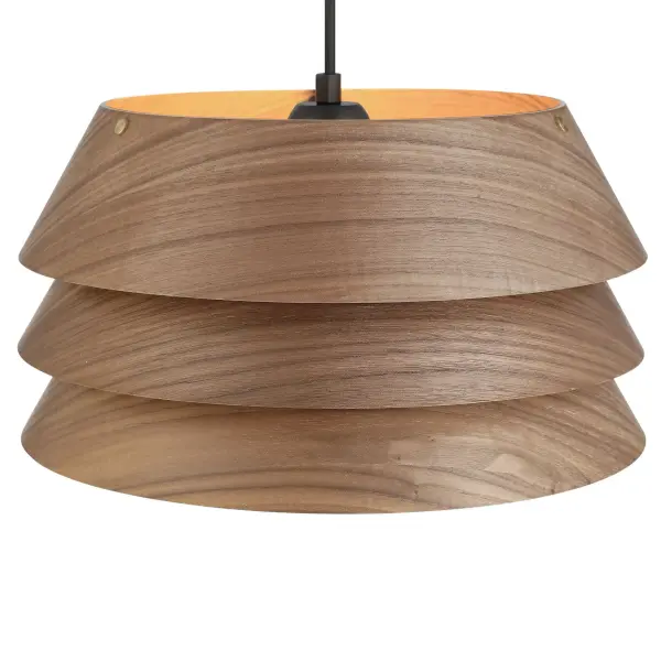 The Golden Lighting Aalto 6" Pendant highlights the natural beauty of wood through a sculptural, tiered silhouette crafted from rich dark walnut veneer. Multiple curved layers are stacked to create depth and dimension while softly shaping the light below. The warm walnut tones and flowing grain patterns introduce organic texture, while the clean suspension keeps the design refined and contemporary. Finished in Dark Walnut with a smooth satin luster, this compact pendant adds warmth and visual interest without overwhelming the space. Measuring 6.6"W x 6.6"H x 8.65"D, it is ideal for kitchens, dining areas, bedrooms, and decorative accent lighting. Dry-location rated and sloped-ceiling compatible, the adjustable hanging height allows for flexible installation. The fixture requires one E26 medium base bulb (not included) for customizable illumination. Collection: Aalto Finish: Dark Walnut Glass: Dark Walnut Width: 13.25" Height: 7.00" Weight: 2.44 lb Extension from Wall: 13.25" Canopy: 4.7"W x 4.7"H x 0.98"D Number of Bulbs: 1 Maximum Wattage: 60.00 W Bulb Type: A19 Bulb Base: E26 Dimmable Voltage: 120.00 V Country of Origin: China Safety Listing: ETL Manufacturer Warranty: 1 Year Limited