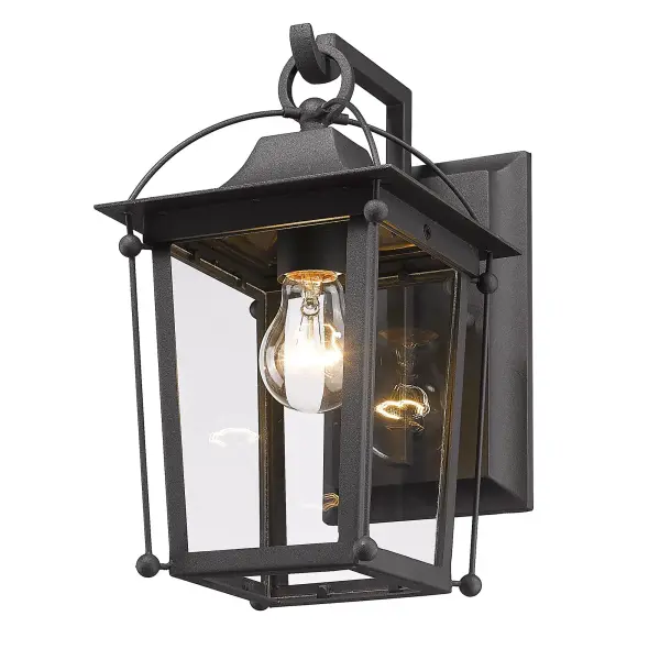 The Brigham outdoor wall sconce combines traditional elegance with practical durability. Its natural black finish and clear glass shade create a welcoming glow at entryways and patios, while wet location rating ensures year-round performance.
