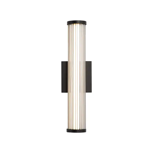 The Rodara 17" outdoor wall sconce combines contemporary style with practical functionality. Its matte black aluminum frame and clear ribbed glass shade create beautiful light refraction while withstanding harsh weather conditions.