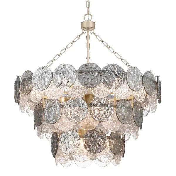 The Cascada 13-light pendant combines coastal elegance with contemporary sophistication through hammered water glass discs and an artisanal Aegean Silver finish. Its generous 31.75" diameter creates dramatic visual impact while the smoke plated glass offers dynamic lighting effects.