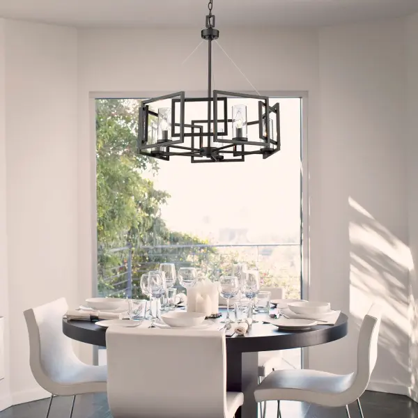 The Marco 5-Light Chandelier delivers clean, modern design with its matte black frame and clear glass shades. Perfect for dining rooms and living spaces, it offers adjustable height and versatile styling that complements contemporary interiors. - alternate view