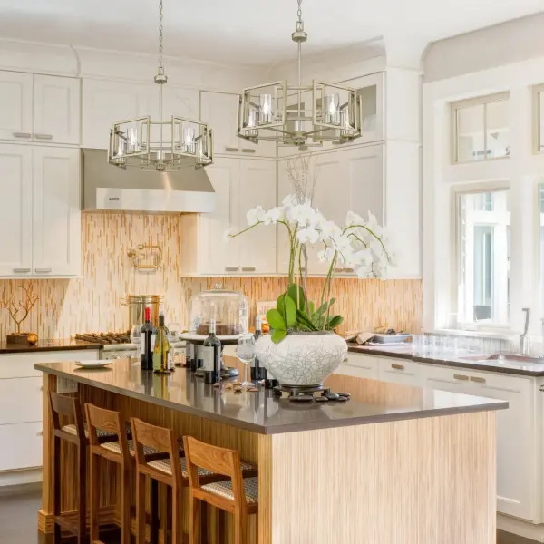 The Marco 5-Light Chandelier combines modern sophistication with timeless elegance through its unique white gold finish and clear glass shades. Perfect for medium-sized spaces, it offers adjustable height and sloped-ceiling compatibility. - alternate view