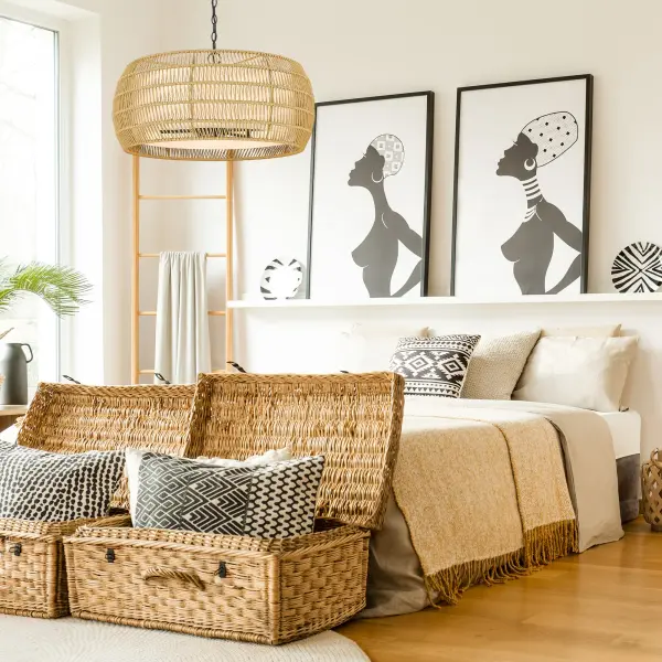 The Golden Lighting Everly brings organic warmth to any space with its natural rattan shade and sleek matte black frame. Perfect for coastal, bohemian, or transitional interiors, this 6-light chandelier offers adjustable height and damp location rating for versatile placement. - alternate view