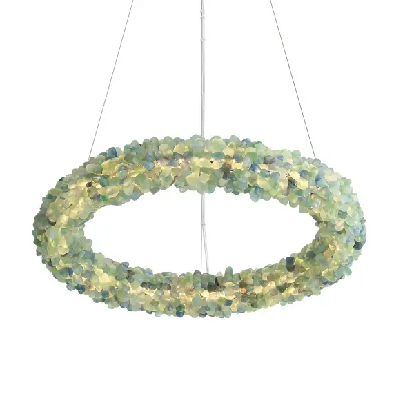 The Corallo Chandelier transforms spaces with hand-selected green fluorite stones that create an ethereal turquoise glow. Energy-efficient integrated LED technology delivers 4540 lumens at 3000K, combining natural beauty with modern functionality.
