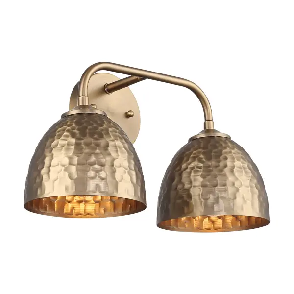 The Shepard 2-Light Vanity combines traditional elegance with farmhouse charm, featuring a sophisticated Modern Brass finish and matching metal shades. Damp-rated for bathroom versatility with practical task lighting.