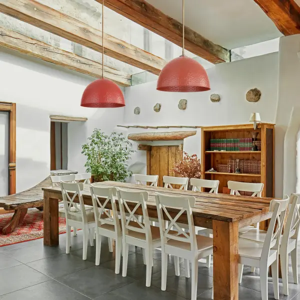 The Shepard pendant combines vintage-inspired hammered metal with modern brass elegance, creating warm, earthy ambiance. Its adjustable cord and damp location rating make it versatile for various spaces from kitchens to covered porches. - alternate view