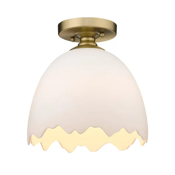 The Brinkley semi-flush mount combines modern artistry with understated elegance. Its unique porcelain shade features an organic shape with broken-edge detail that emits a soft, warm glow, while the brushed champagne brass finish adds contemporary sophistication.