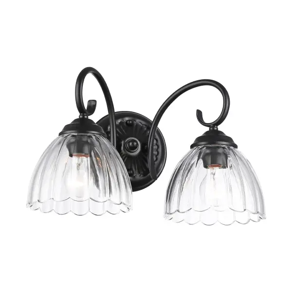 The Audra 2-light vanity combines modern sophistication with practical task lighting. Its matte black finish and clear glass shades create a striking contrast that elevates bathroom aesthetics while providing excellent illumination.
