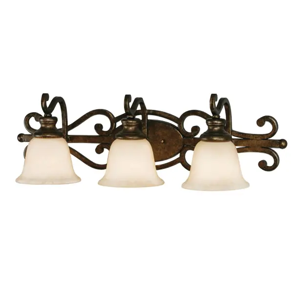 The Heartwood vanity light combines traditional elegance with rustic character through its textured tea stone glass and warm burnt sienna finish. The three-light configuration provides ample task lighting for bathrooms while the artisanal glass creates inviting ambient glow.