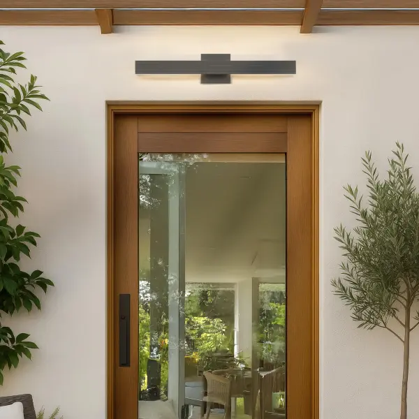 The Enso outdoor wall light combines minimalist design with practical functionality. Its linear fluted texture creates beautiful light patterns while the integrated LED offers five color temperature options from warm to cool white. - alternate view