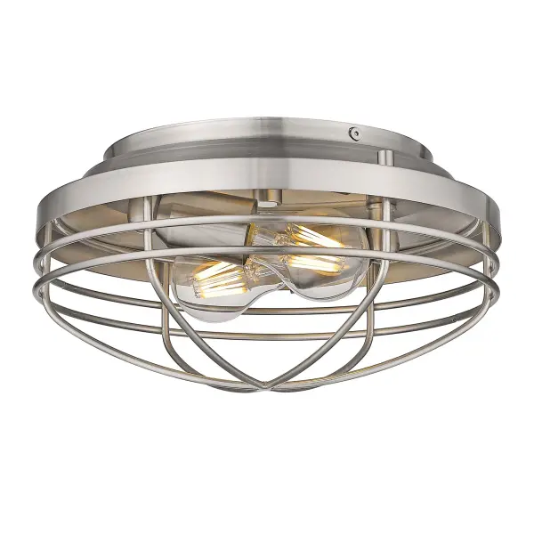 The Golden Lighting Seaport flush mount combines coastal elegance with practical functionality. Its pewter finish and metal shade create a sophisticated, non-glare glow ideal for hallways, bathrooms, and closets.