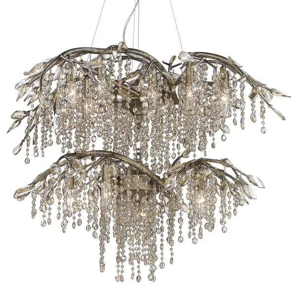 The Autumn Twilight chandelier brings organic beauty indoors with hand-forged branch-like arms and cascading crystal leaves. Its Mystic Gold finish adds warmth and character, while 18 lights provide ample illumination for grand spaces.