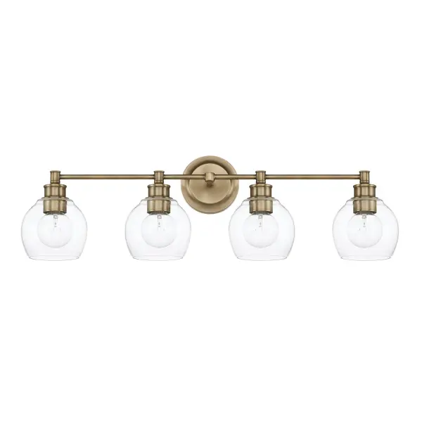 This 4-light vanity fixture brings authentic mid-century style to bathroom spaces with its aged brass finish and clean horizontal design. At 32 inches wide, it provides excellent illumination for double vanities.