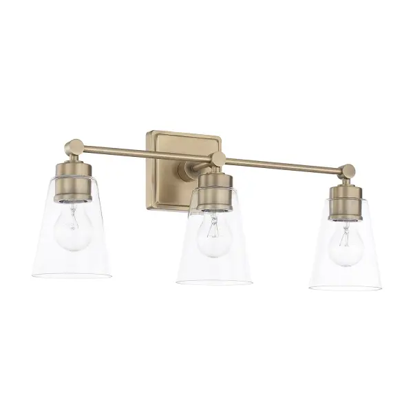 The Rory 3-Light Vanity combines timeless aged brass finish with clean contemporary lines, making it ideal for bathroom updates. Its 23-inch width provides excellent illumination for medium vanities.
