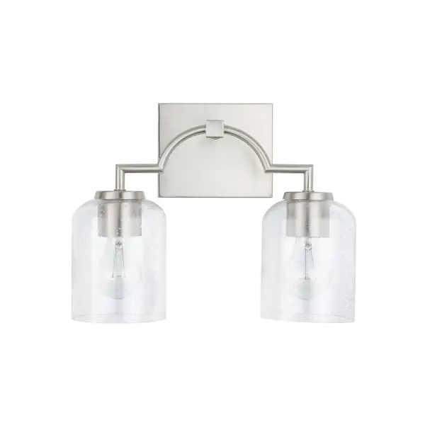The Carter 2-Light Vanity offers clean transitional styling in a space-efficient 14-inch width. Its brushed nickel finish provides timeless appeal while the compact profile makes it ideal for powder rooms and guest baths.