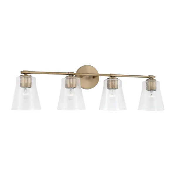 The Baker 4-Light Vanity combines transitional styling with a sophisticated aged brass finish, providing ample illumination across 31.75 inches. Perfect for medium to large bathrooms seeking both function and style.