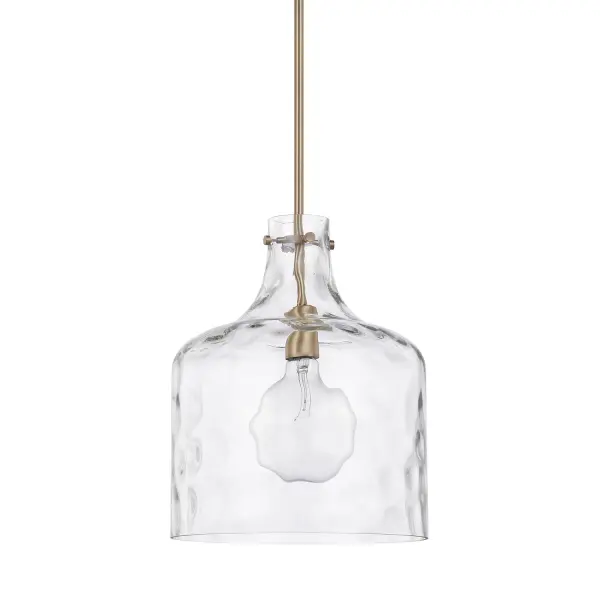 The Crawford pendant delivers warm aged brass character in a compact 11.75-inch profile. Its modest scale makes it ideal for kitchen islands, bathroom vanities, or clustered installations where multiple fixtures create impact.