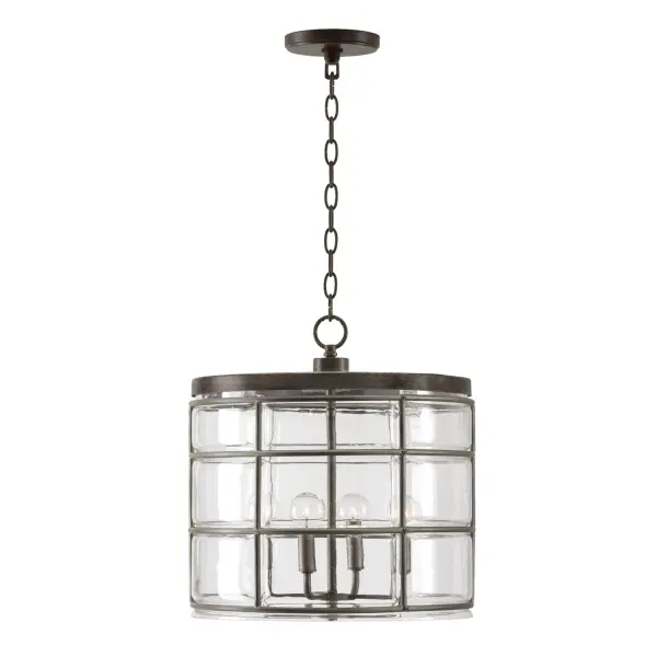 The Colby 4-Light Pendant brings industrial style to smaller spaces with its compact 15.25-inch width. The Urban Grey finish offers a contemporary twist on classic metal fixtures, making it ideal for kitchen islands and dining nooks.