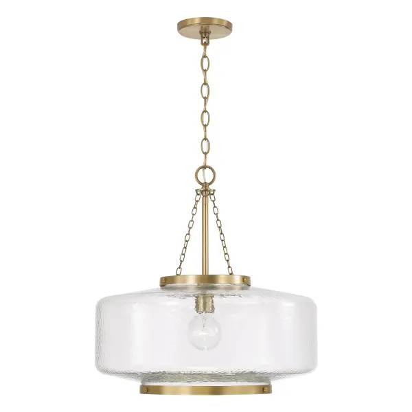 The Landon pendant combines classic form with contemporary appeal through its aged brass finish. At nearly 20 inches wide, it provides substantial presence while maintaining versatility across traditional and modern interiors.