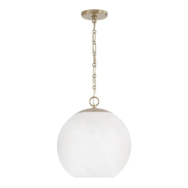 The Cleo pendant delivers warm metallic elegance in a compact 13.5-inch profile. Its matte brass finish adds sophisticated warmth to kitchens, powder rooms, and hallways without overwhelming smaller spaces.