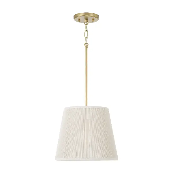 The Tara pendant delivers warm metallic elegance in a compact 12-inch profile. Its matte brass finish adds sophisticated warmth to kitchens, bathrooms, and hallways without overwhelming smaller spaces.