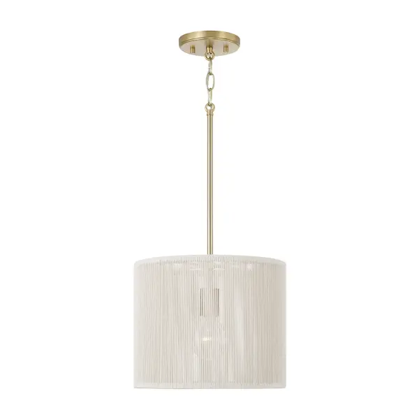 The Tara pendant delivers warm metallic elegance in a compact 12-inch profile. Its matte brass finish adds sophisticated warmth to kitchens, bathrooms, and hallways without overwhelming smaller spaces.