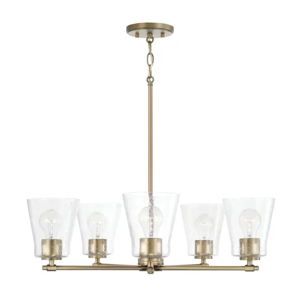 The Baker chandelier brings sophisticated linear design to dining and kitchen spaces. Its 27-inch width and aged brass finish create a warm, inviting ambiance perfect for transitional interiors.