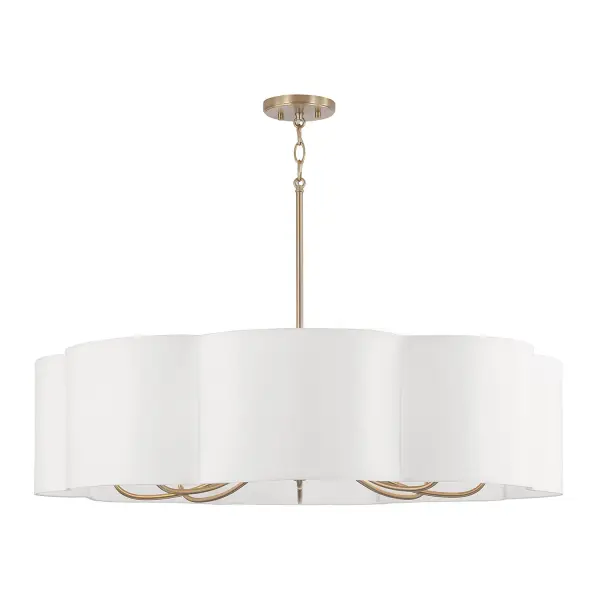 The Sabine 8-Light Chandelier combines modern linear design with warm matte brass finish, creating sophisticated illumination for dining and living spaces. Its 36-inch width makes it perfect for medium-sized rooms.