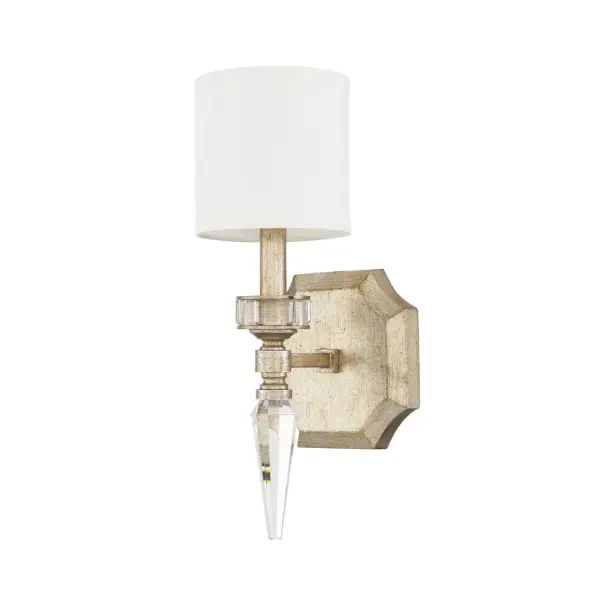 The Olivia wall sconce delivers refined lighting in a compact 6-inch profile, perfect for smaller spaces. Its Winter Gold finish adds warmth and sophistication to bathrooms, hallways, and powder rooms.