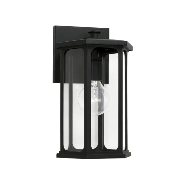 The Walton outdoor wall lantern combines traditional lantern styling with durable black finish, perfect for adding welcoming illumination to entryways, porches, and patios. Compact 8-inch width fits smaller spaces beautifully.