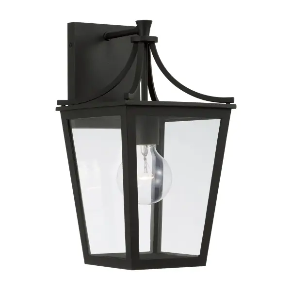 The Adair outdoor wall lantern combines traditional styling with durable construction. Its compact 7.5" width and 14.25" height make it ideal for smaller outdoor spaces while providing reliable illumination.