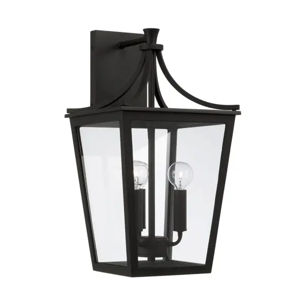 The Adair 3-Light Outdoor Wall Lantern combines traditional design with durable outdoor construction. Its medium size and classic black finish make it versatile for various exterior applications.