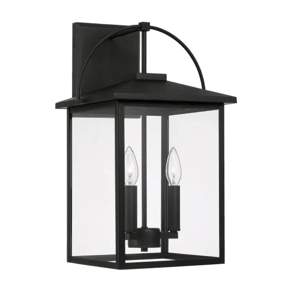 The Bryson 3-Light Outdoor Wall Lantern combines traditional design with durable outdoor construction. Its medium scale and classic black finish make it versatile for various exterior applications.