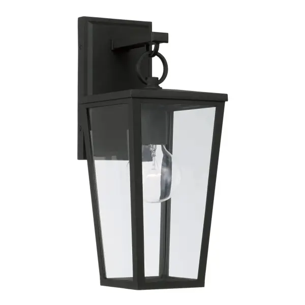 The Elliott wall lantern brings traditional charm to outdoor spaces with its compact 6.25" profile and classic lantern silhouette. Perfect for flanking doorways or illuminating walkways with understated elegance.
