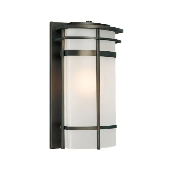 The Lakeshore wall lantern brings traditional charm to outdoor spaces with its Old Bronze finish and classic lantern silhouette. At 19 inches tall, it provides substantial presence while maintaining elegant proportions.