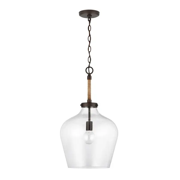 The Boland pendant combines classic bronze finish with a compact 14-inch profile, making it ideal for smaller dining areas, kitchen islands, or entryways. Its transitional design bridges traditional and contemporary styles.