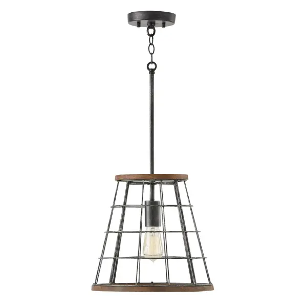 The Bracken pendant blends rustic warmth with industrial edge through its distinctive zinc and wood finish. At 13.5 inches wide, it's perfectly scaled for intimate spaces, breakfast nooks, or clustered over kitchen islands.