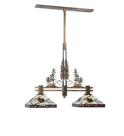 A stand of Tall Pines in front of a mountainside top the frame of this island/billiard pendant. This charming nature inspired fixture features Pinecone Mission design shades with Bark Brown granite glass Pinecones on a Clear granite glass background with pine needle detailing. Bone beige stained glass is geometrically divided by Burgundy and Moss Green bands on shades; suspended by hardware hand finished in Anitque Copper. - alternate view