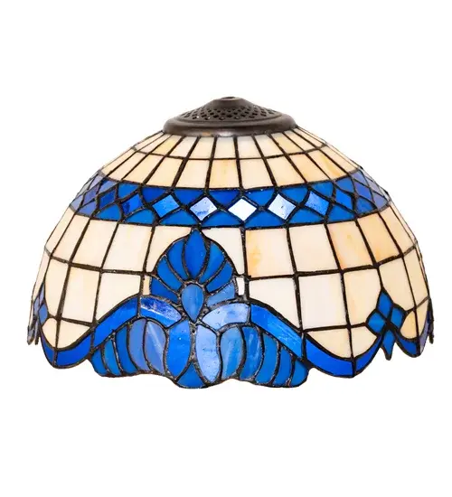 Regal scrolls and flourishes of Wedgewood Blue with coordinating diamond accents on a Beige gridwork art glass background adorn this exquisite Tiffany styled shade. This beautiful art glass shade is created using the famous Meyda Tiffany copperfoil construction process. Ideal for pairing with a base to create a charming table or floor lamp; or building a stunning ceiling or wall fixture with the appropriate hardware. The Baroque Shade is included in our American designed handcrafted Tiffany Stained Glass Collection. Each shade is a unique work of art with color variations based on natural ingredients inherent in the glass. Contact us if color matching is critical when ordering multiple items.
