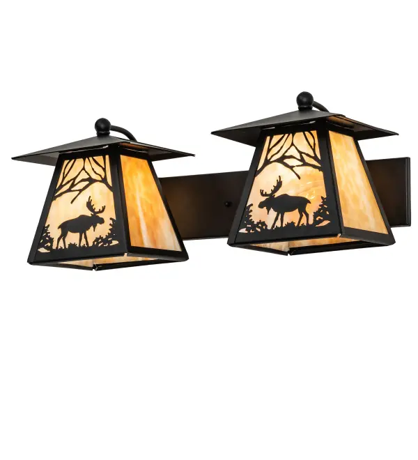 The majestic North Woods Moose is depicted on this wildlife inspired lantern two light vanity. The fixture is finished in Textured Black; has Beige art glass panels; and is handcrafted in the USA by Meyda artisans.