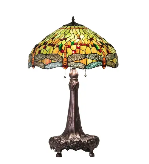 Inspired by one of Tiffany Studio's classic Dragonfly lighting masterpiece. Orange dragonflies with glowing Red jeweled eyes and Multi-colored filigree wings dive over a Green and Orange background. The stunning shade is accented with Red; Green and Amber glass jewels. The art glass shade is created using the famous Meyda Tiffany copperfoil construction. The table base features a warm Mahogany Bronze finish. UL and cUL listed for dry locations. - alternate view