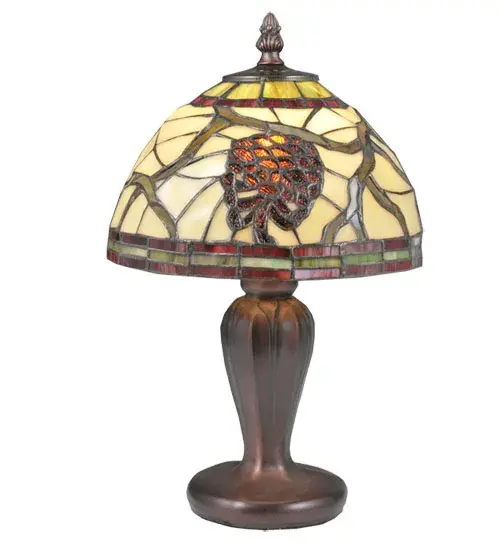 This stunning art glass design features the iconic Pinecone; one of Mother Nature's most compelling organic symbols; which offers natural elegance and represents the evolution of human enlightenment. Burgundy and Leaf Green bands edge this woodland shade highlighting Light Brown pinecones and Golden Sun branches on a Beige art glass shade. The art glass shade is created using the famous Meyda Tiffany copperfoil construction process and embraced by a base finished in Mahogany Bronze. The Pinecone Mini Lamp is featured in our American-designed; handcrafted Nature-Inspired Lighting Collection. UL and cUL listed for dry locations. Each piece is a unique work of art with color variations based on natural ingredients inherent in the glass. - alternate view
