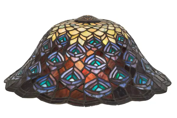 This Peacock Feather design is a favorite Tiffany pattern. Mauve with Beige; Pink; Orange & Gray art glass adorn the bottom of the shade while feathers feature Turquoise Blue and Purple. A scalloped crest featuring Purple; Blue; Orange and Green edges a ring of plumage of the undulating shade; created using the Meyda Tiffany copperfoil construction. Pairs with a base to create a table or floor lamp or hardware for a ceiling or wall fixture. The Peacock Feather Shade is featured in our American designed; handcrafted Tiffany Reproduction Stained Glass Lighting Collection. Each is a unique work of art with color variations based on natural ingredients inherent in the glass. Contact us if color matching is critical when ordering multiple items.